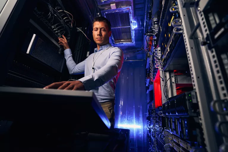 technician setting up network hardware